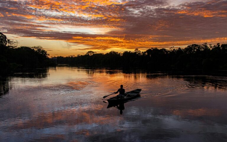 Fisherman at Sunset on the Amazon River